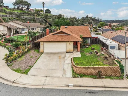 an aerial view of residential house and outdoor space