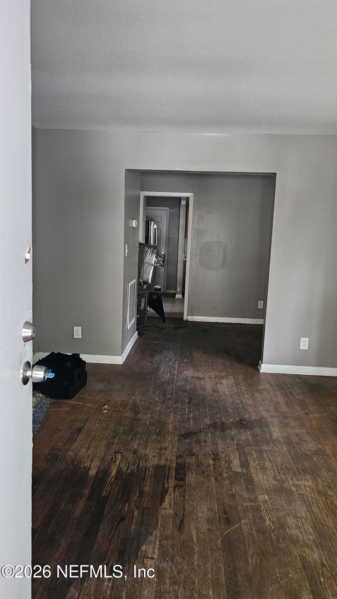 2727 North N Davis Rd Street Jacksonville, FL 32206 - Photo 8 of 31 a view of a livingroom with storage & utility