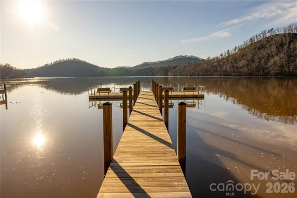 a view of a terrace with a table and chairs