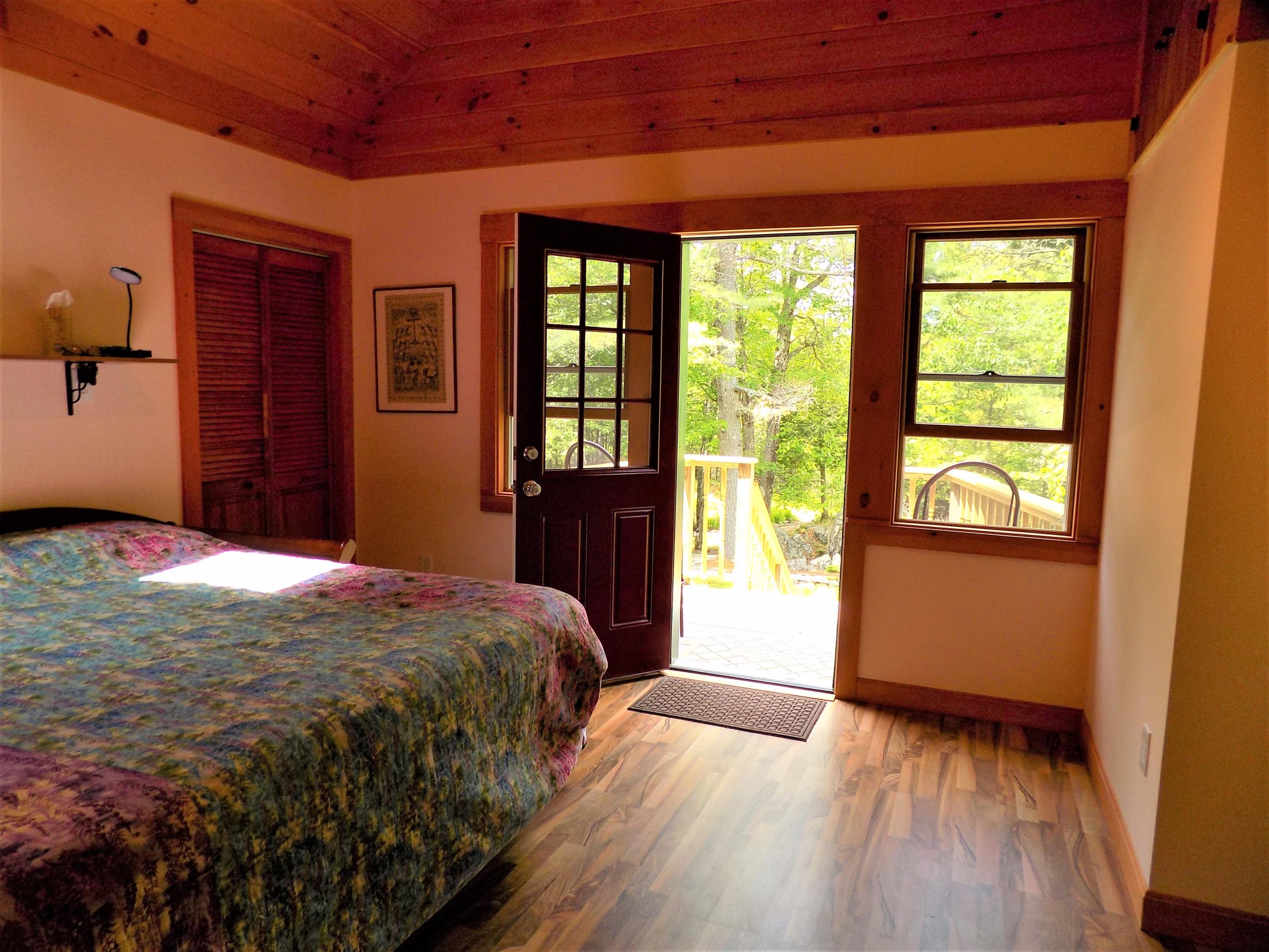 43 Pomroy Road Hancock, ME 04640 - Photo 17 of 40 master bedroom and deck