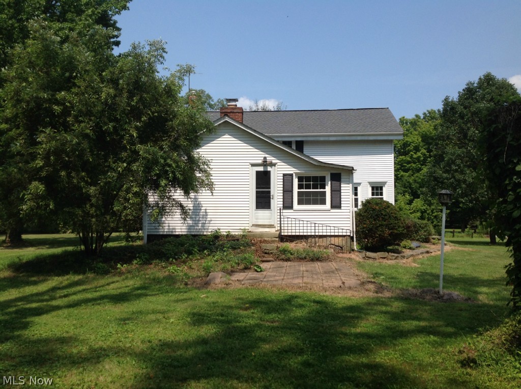 1764 Ridgewood Road Wadsworth, OH 44281 - Photo 24 of 24 Back of home, patio is located off the back of the kitchen. Great place to add an outdoor kitchen area.