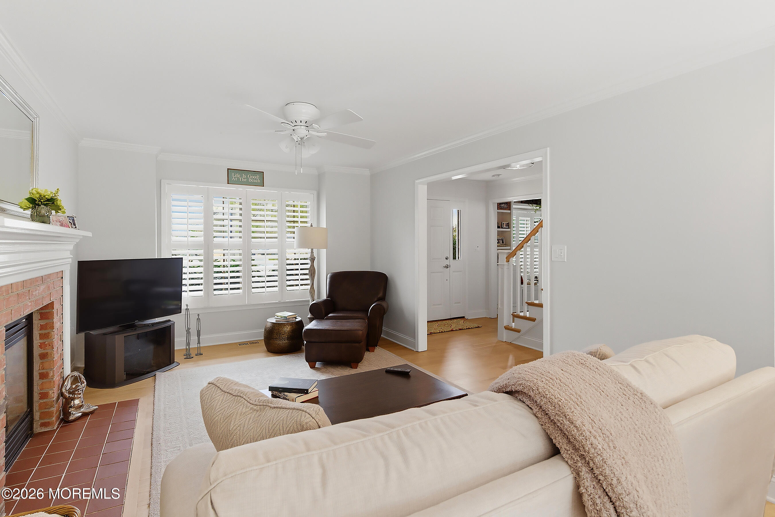 924 Ocean Road Point Pleasant, NJ 08742 - Photo 7 of 56 a bedroom with furniture a bed and a flat screen tv