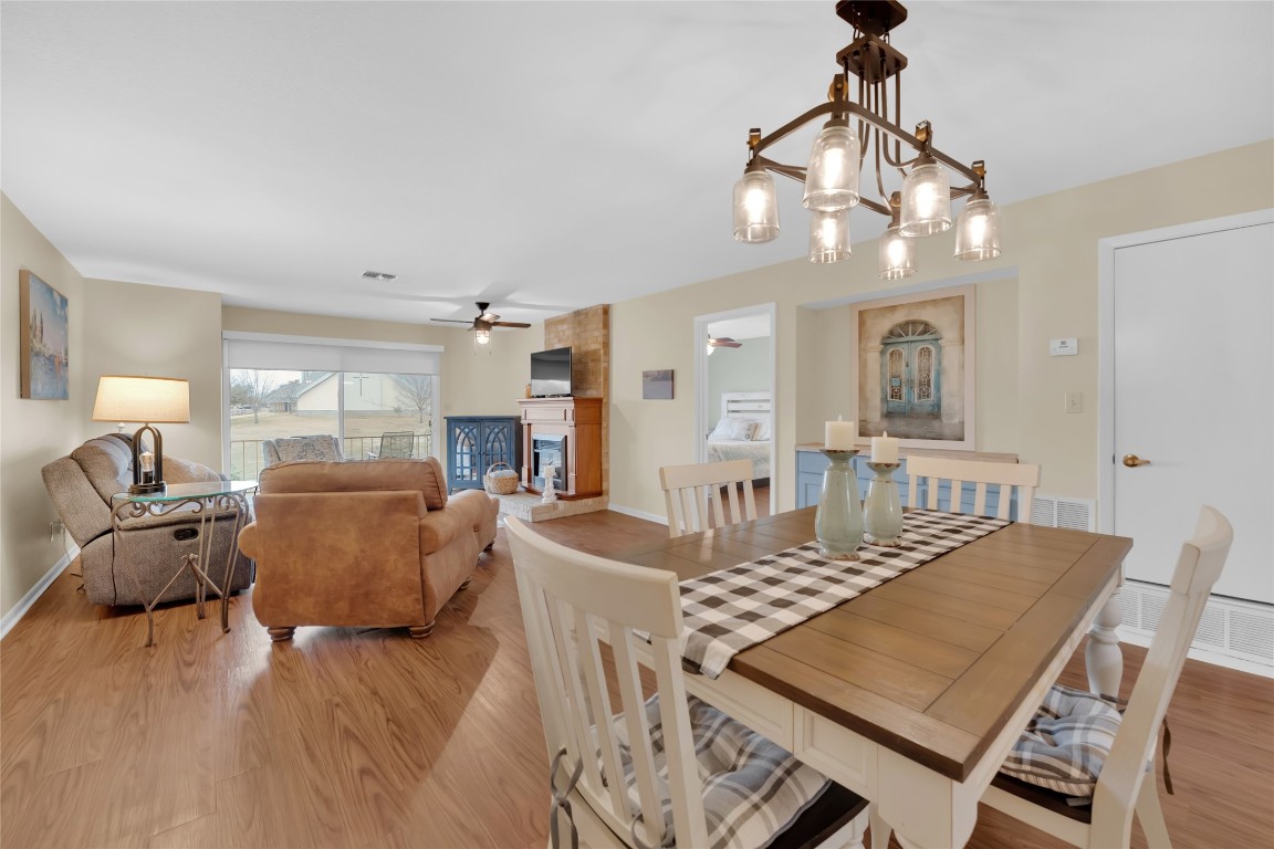 1201 Ranch Road 1431, Unit 8 Marble Falls, TX 78654 - Photo 2 of 24 Living and Dining with 8ft sliding door.