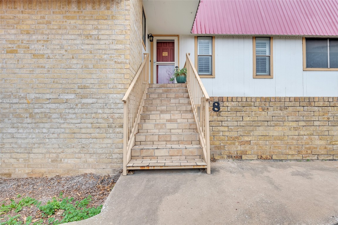 1201 Ranch Road 1431, Unit 8 Marble Falls, TX 78654 - Photo 22 of 24 Front entrance with moderate stairs.
