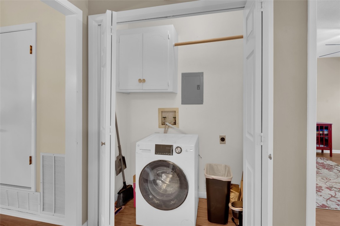 1201 Ranch Road 1431, Unit 8 Marble Falls, TX 78654 - Photo 9 of 24 GE Washer/Dryer Combo unit in utility closet