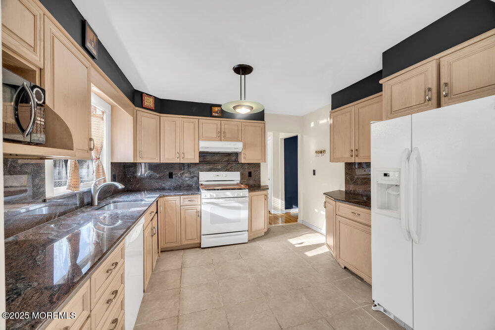 46 Owens Road Old Bridge, NJ 08857 - Photo 11 of 26 a kitchen with stainless steel appliances a refrigerator sink and cabinets