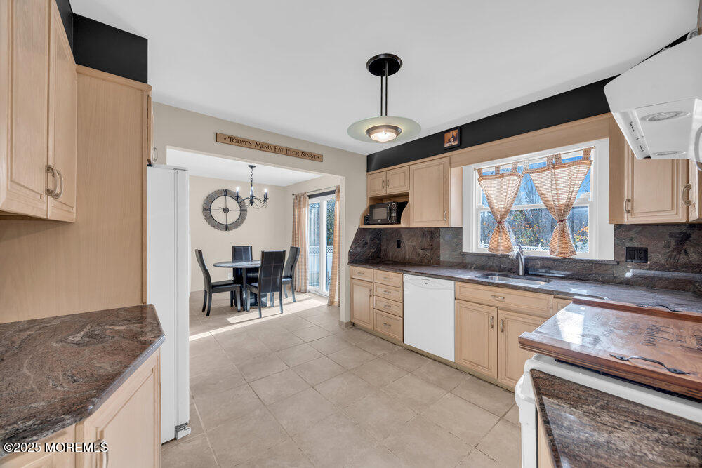 46 Owens Road Old Bridge, NJ 08857 - Photo 12 of 26 a kitchen with sink cabinets and window