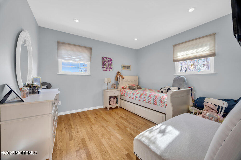 46 Owens Road Old Bridge, NJ 08857 - Photo 16 of 26 a bedroom with two beds and a dresser