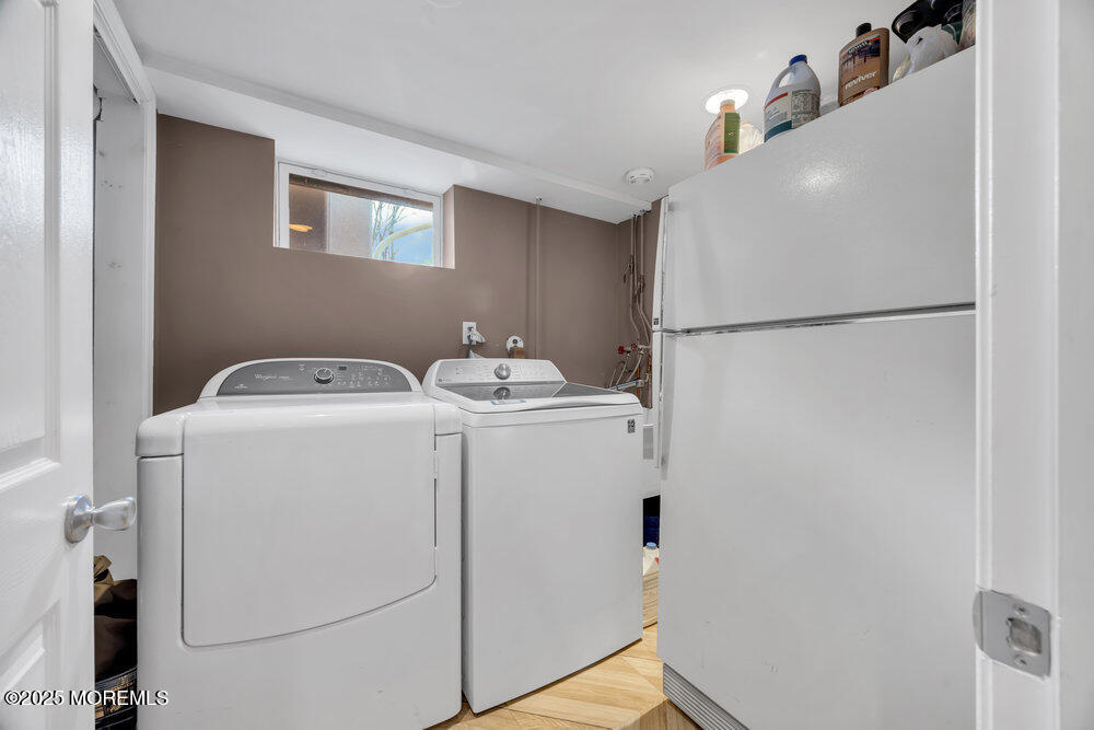 46 Owens Road Old Bridge, NJ 08857 - Photo 20 of 26 a utility room with dryer and washer