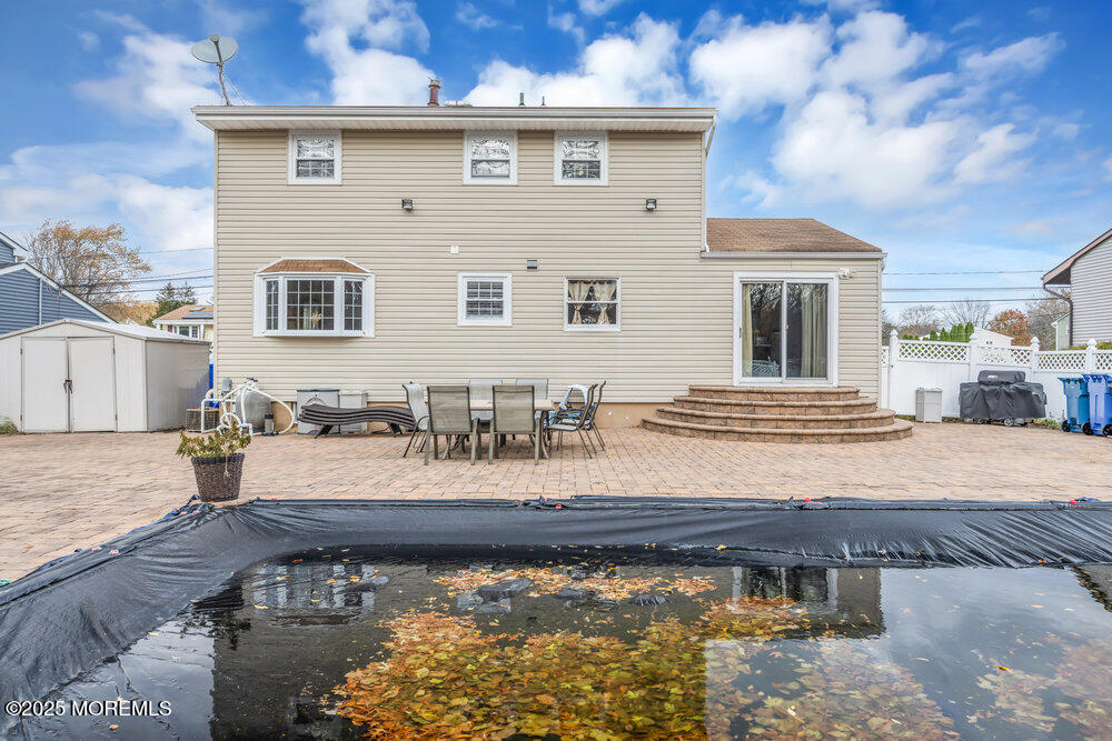 46 Owens Road Old Bridge, NJ 08857 - Photo 24 of 26 a view of a house with backyard and sitting area
