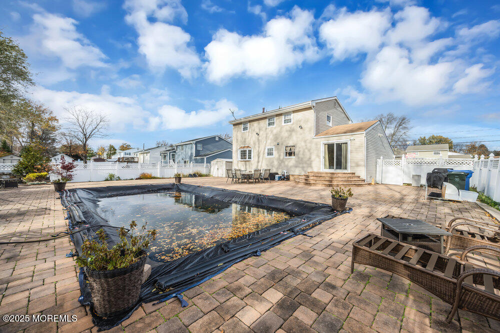46 Owens Road Old Bridge, NJ 08857 - Photo 25 of 26 a view of a swimming pool with lounge chairs