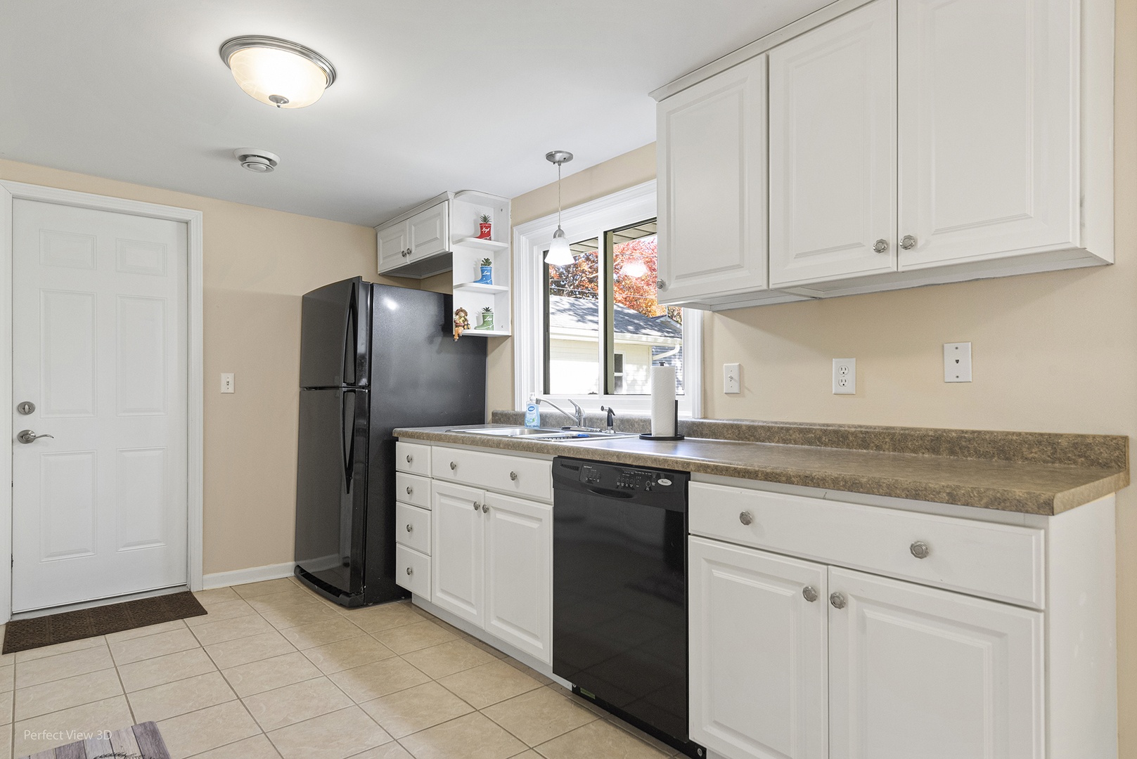 1505 North Kankakee Street Wilmington, IL 60481 - Photo 6 of 7 a kitchen with stainless steel appliances granite countertop a refrigerator sink and cabinets