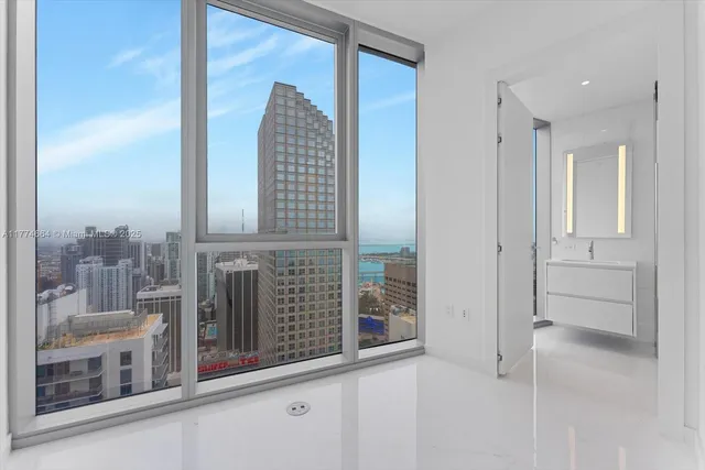 a view of a bathroom with a glass door