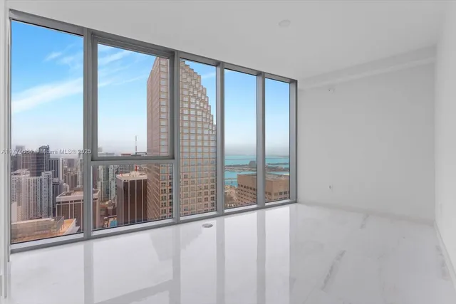 a view of a glass door with a balcony