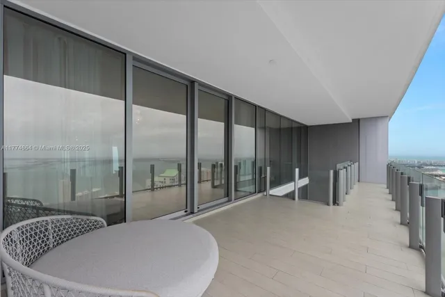 a very nice looking room with a glass door and shower