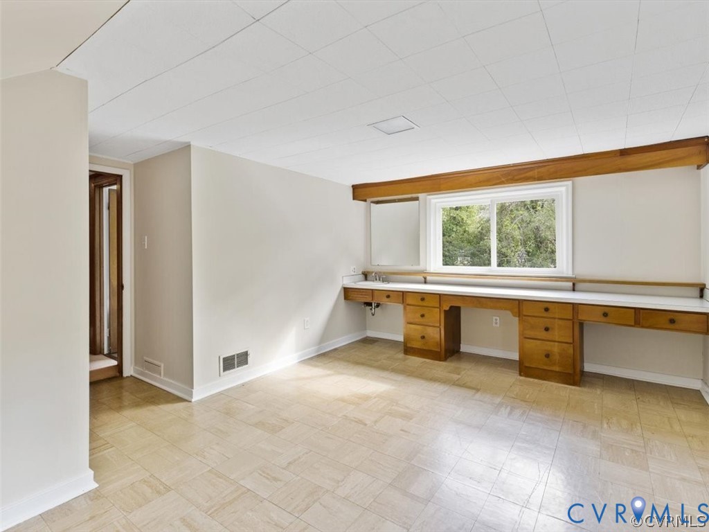 8719 Mapleton Road Henrico, VA 23229 - Photo 19 of 20 Spacious room featuring a long built-in vanity wit