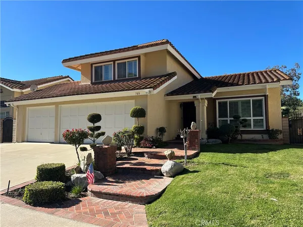a front view of a house with patio