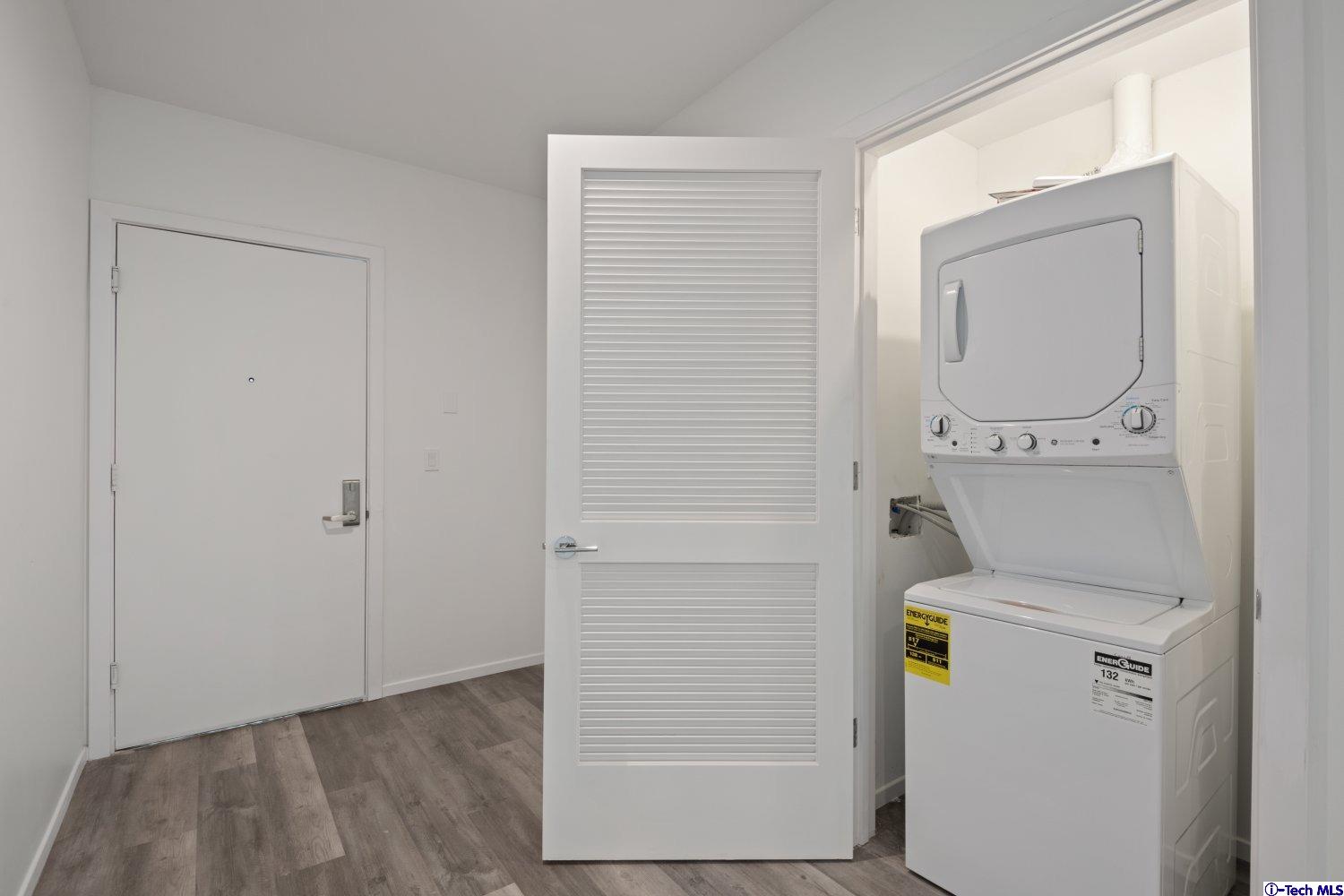 7064 Greeley Street, Unit 201 Tujunga, CA 91042 - Photo 19 of 34 a utility room with dryer and washer