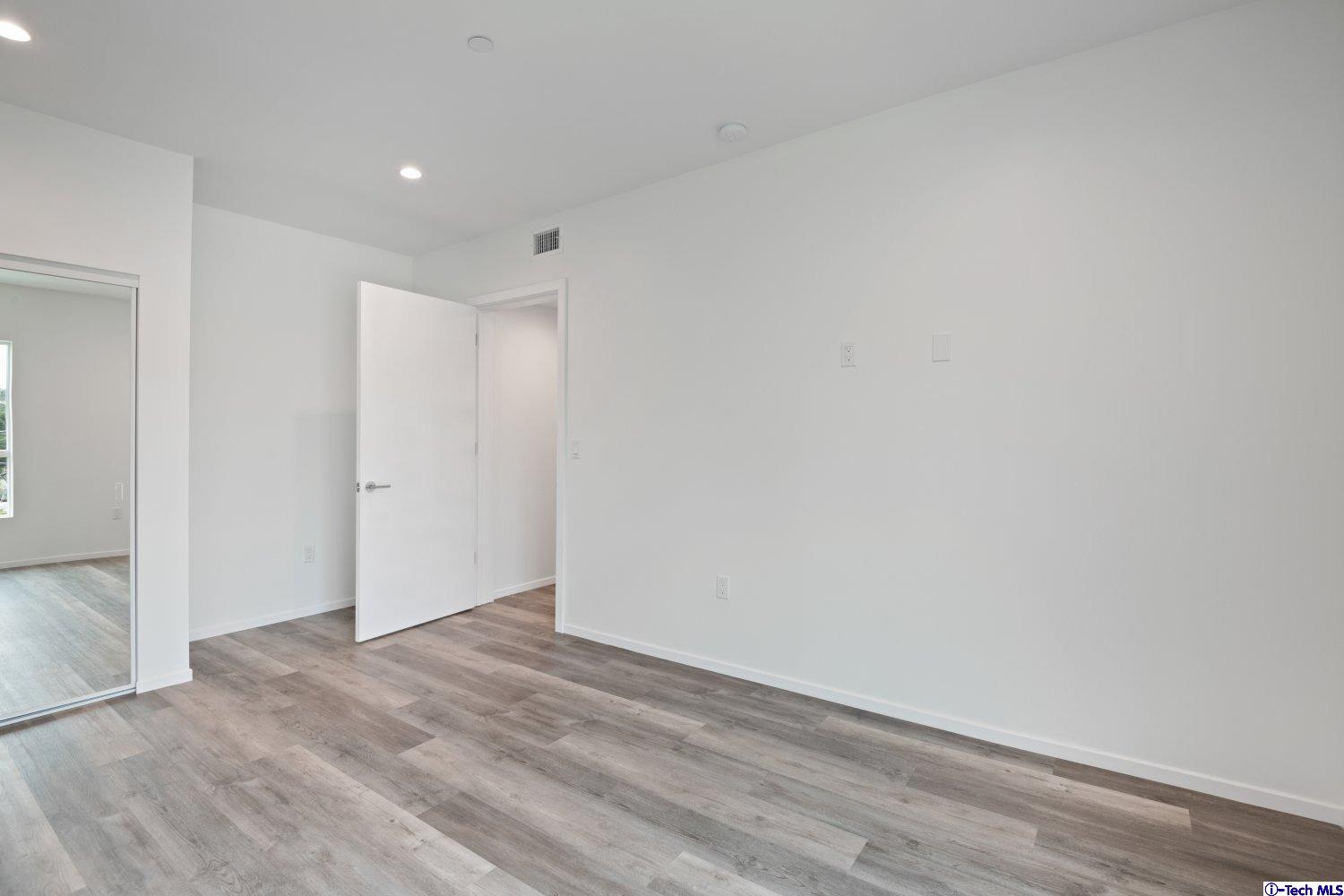 7064 Greeley Street, Unit 201 Tujunga, CA 91042 - Photo 26 of 34 a view of empty room