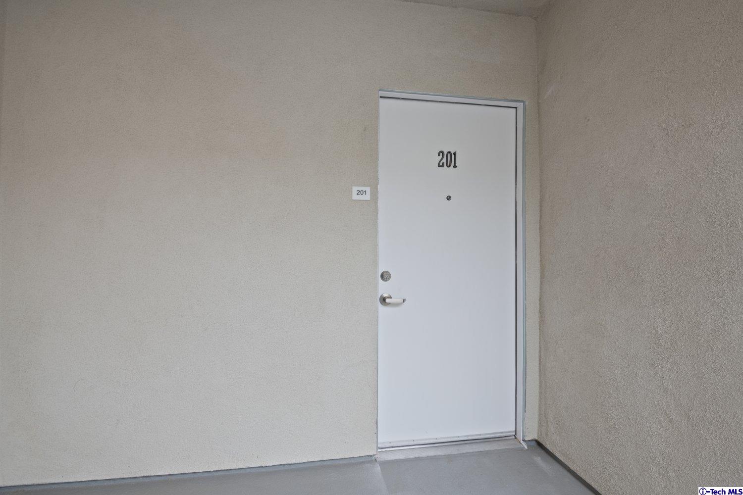 7064 Greeley Street, Unit 201 Tujunga, CA 91042 - Photo 8 of 34 a view of an empty room