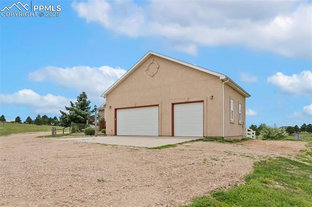 13775 Woodlake Road Elbert, CO 80106 - Photo 43 of 44 View of garage
