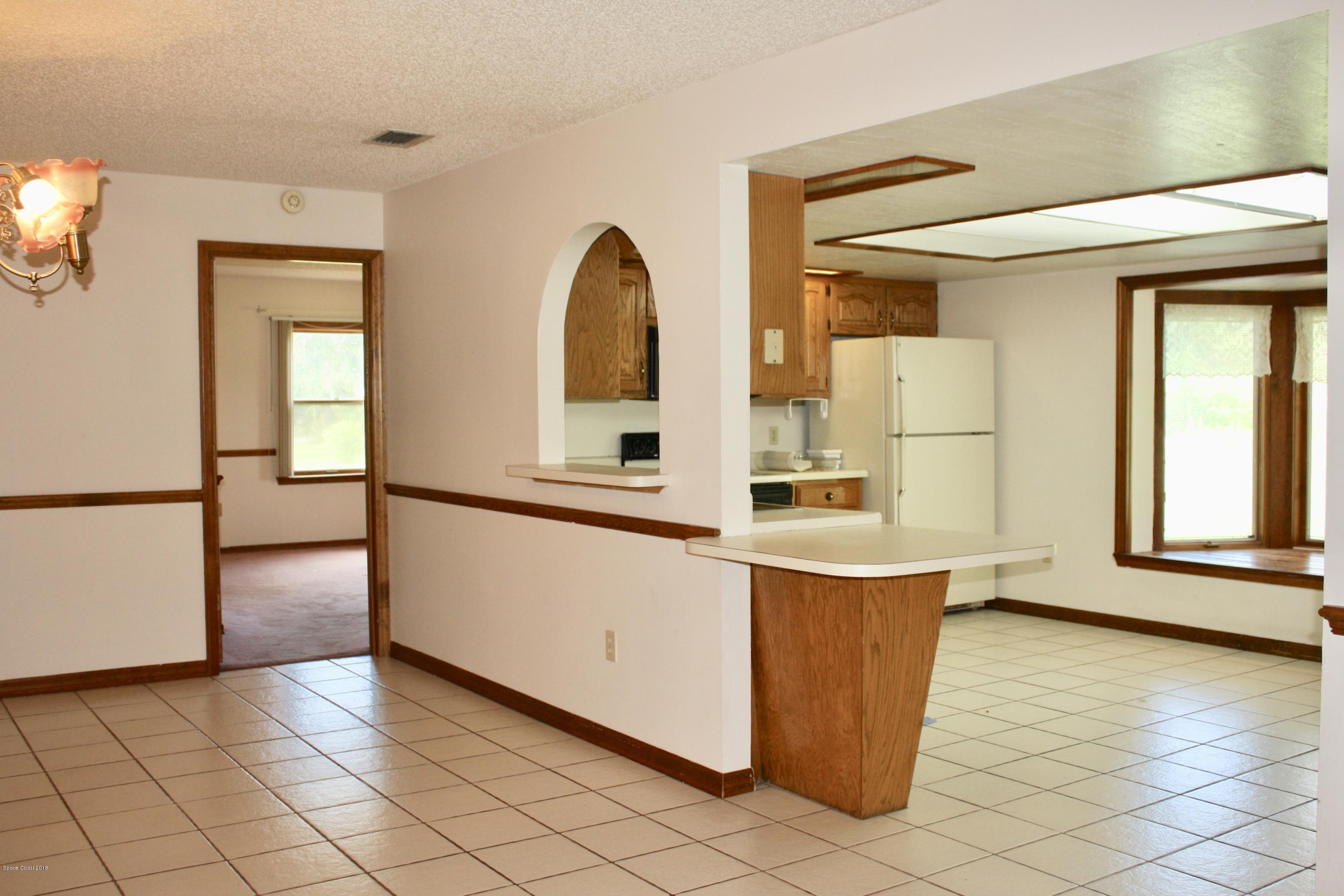 2240 Holder Road Mims, FL 32754 - Photo 4 of 25 fullsizeoutput_299c