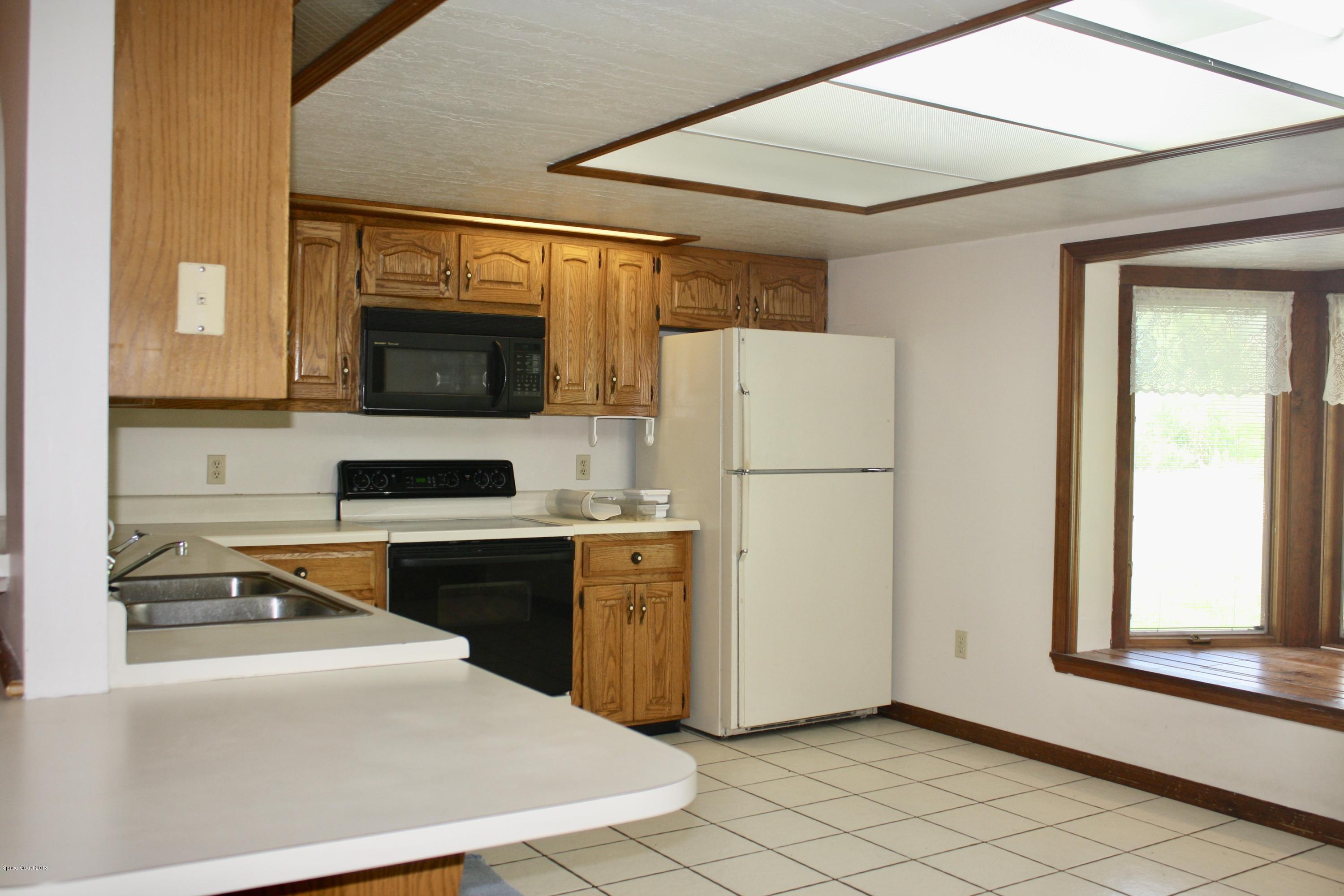 2240 Holder Road Mims, FL 32754 - Photo 5 of 25 fullsizeoutput_29a0