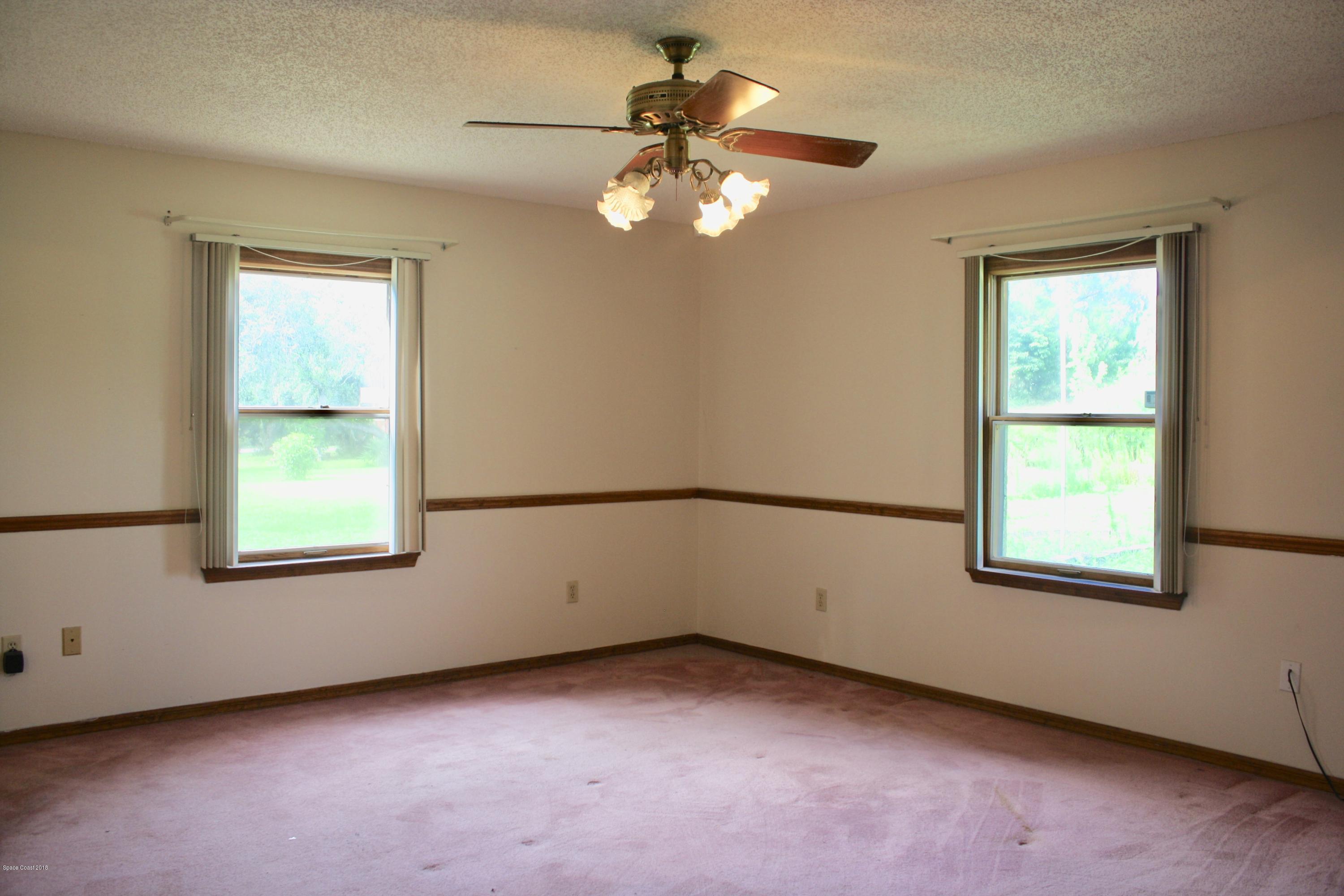 2240 Holder Road Mims, FL 32754 - Photo 8 of 25 fullsizeoutput_29a5