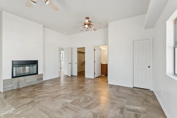 a bathroom with a sink a mirror and shower