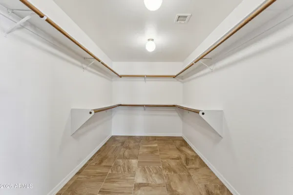 a bathroom with a shower and a shower curtain