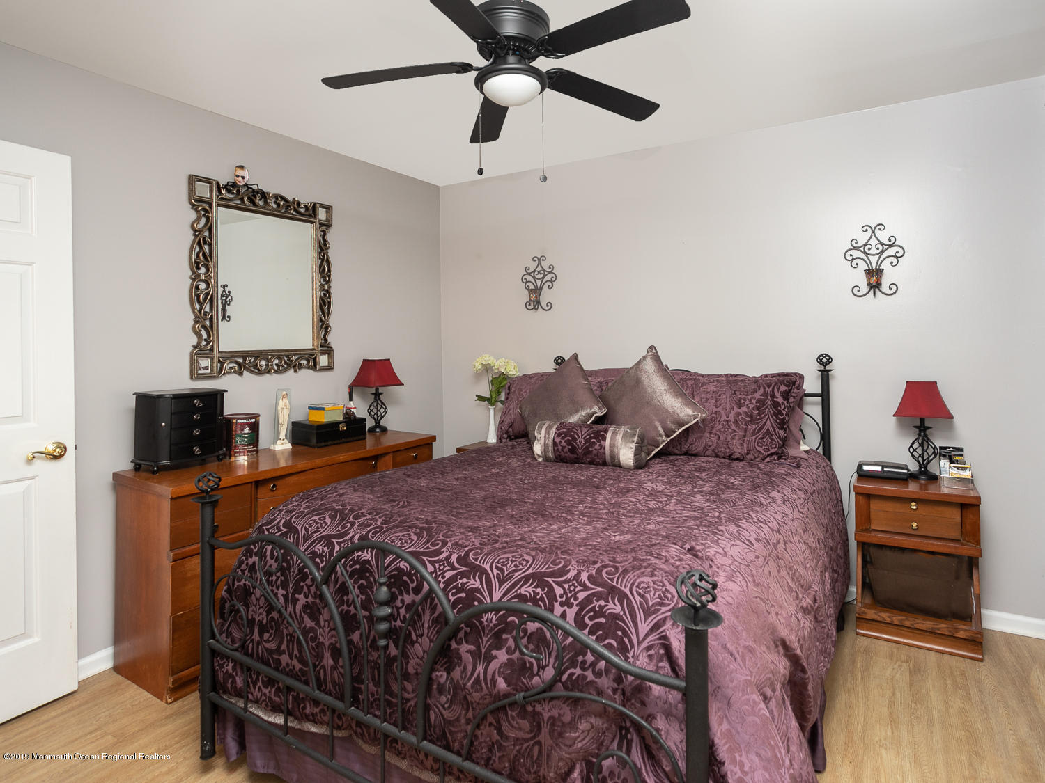 36 Kuzyk Road Cream Ridge, NJ 08514 - Photo 11 of 20 a bedroom with bed and a chandelier