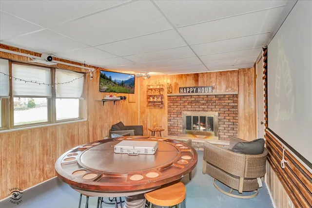 a room with furniture and a fireplace