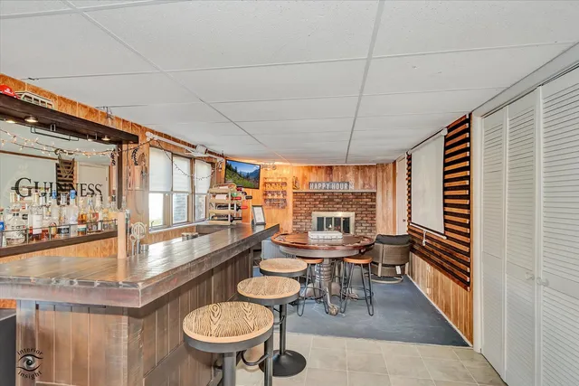 a very nice looking dining room with a table and chairs
