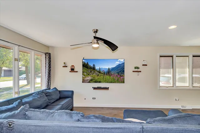 a living room with furniture and window