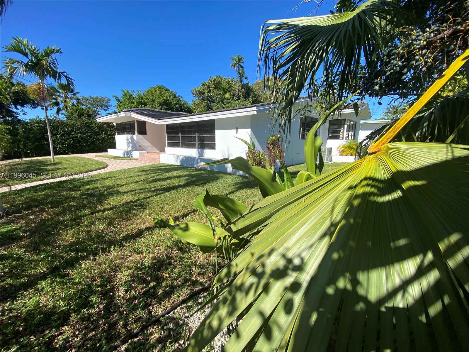 1101 Bay Drive Miami Beach, FL 33141 - Photo 13 of 69 a view of a yard with plants