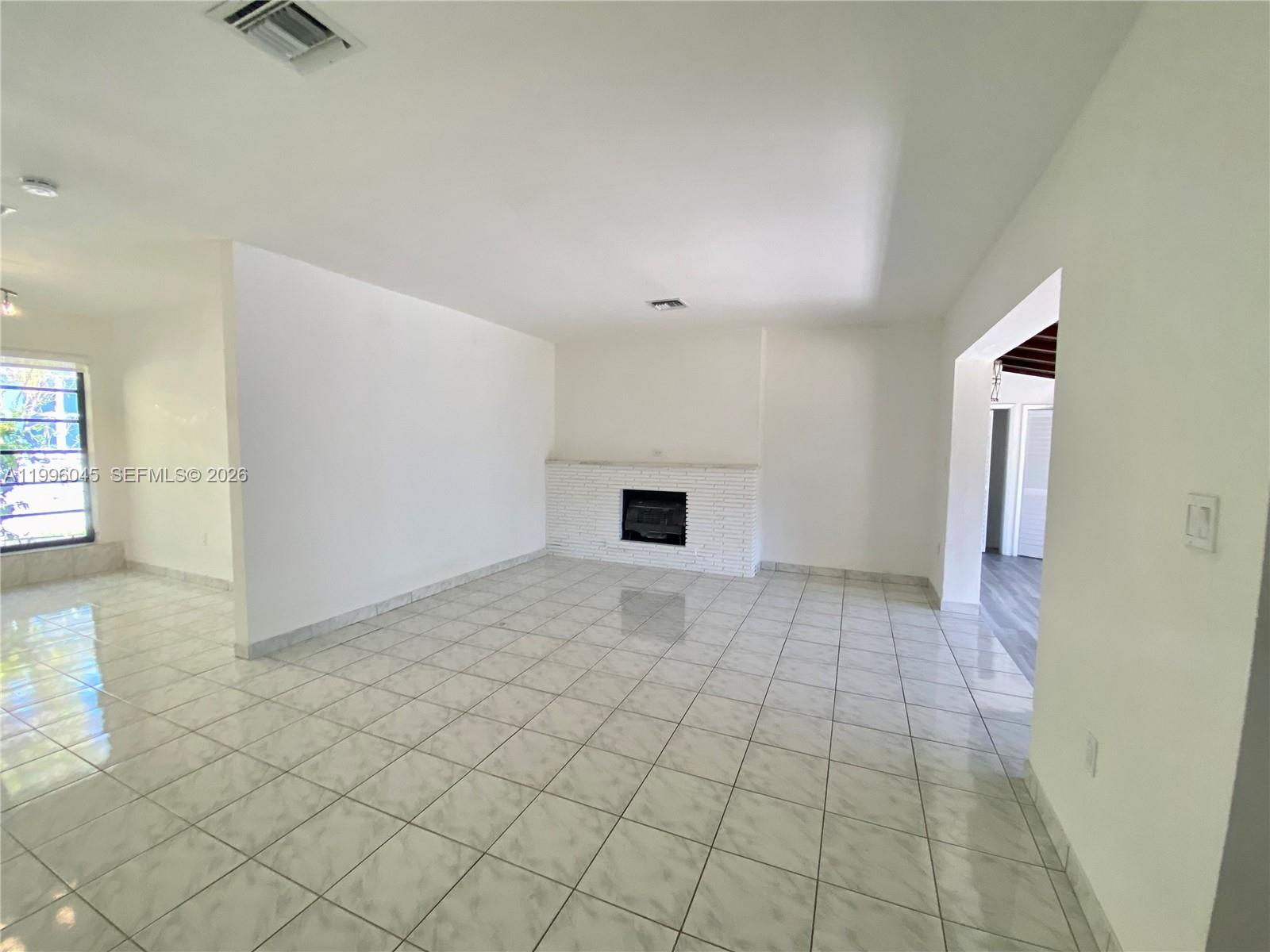 1101 Bay Drive Miami Beach, FL 33141 - Photo 27 of 69 a view of empty room with wooden floor