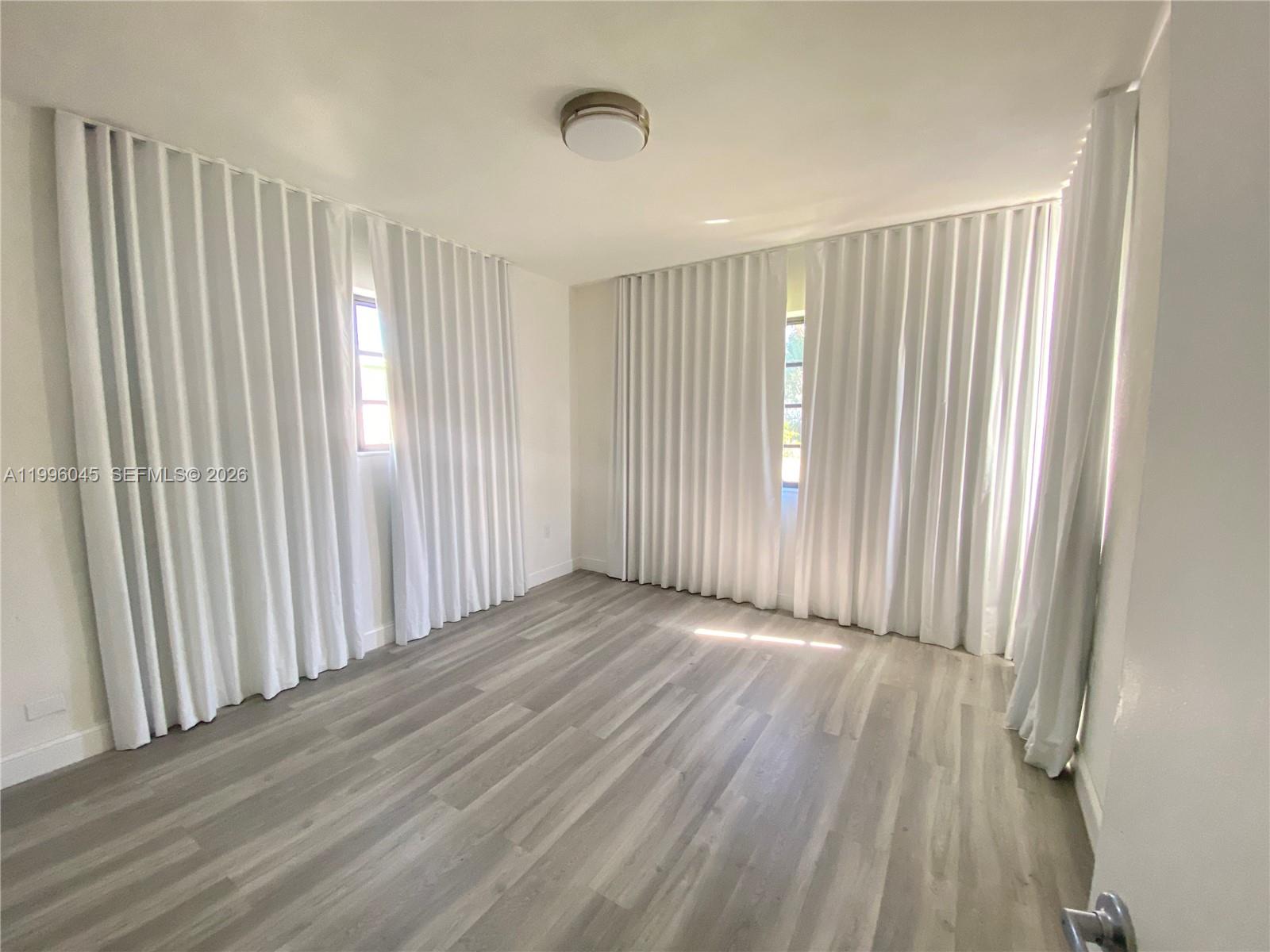 1101 Bay Drive Miami Beach, FL 33141 - Photo 43 of 69 wooden floor in a room