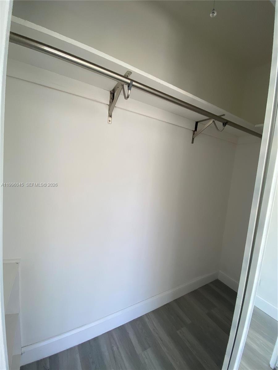 1101 Bay Drive Miami Beach, FL 33141 - Photo 47 of 69 a view of a room with wooden floor