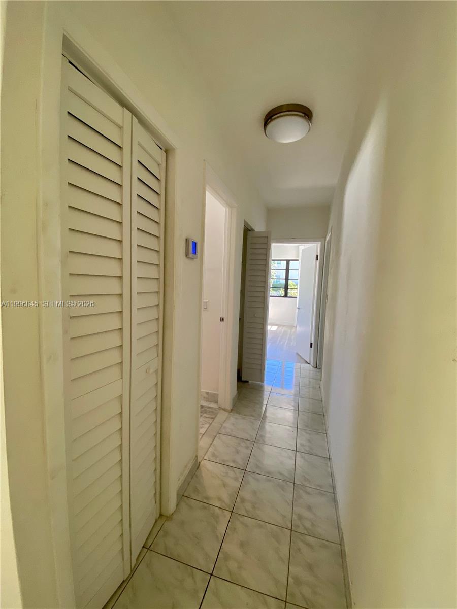 1101 Bay Drive Miami Beach, FL 33141 - Photo 53 of 69 a view of hallway with windows