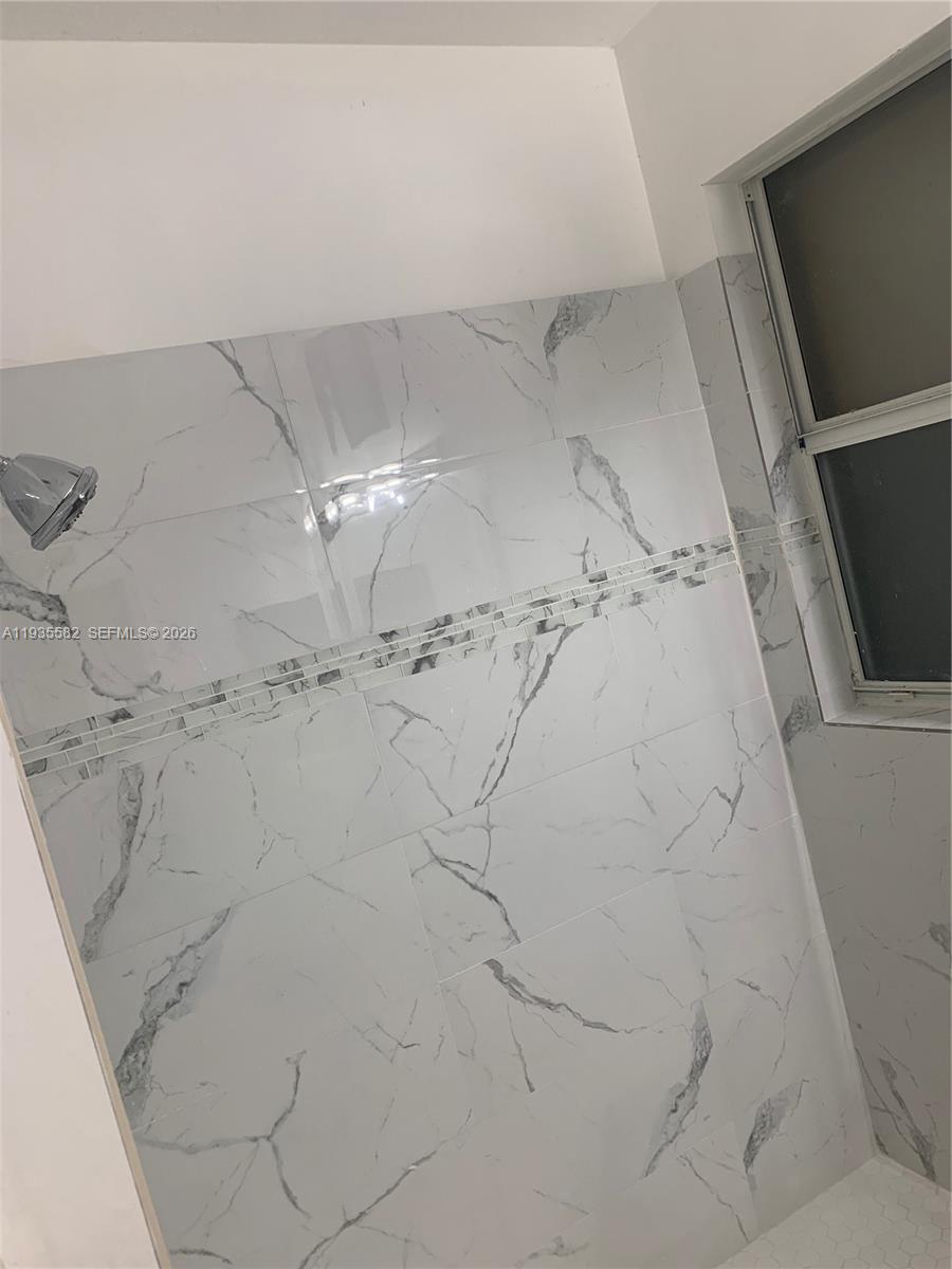 2300 Northeast 37th Road Homestead, FL 33033 - Photo 6 of 6 a bathroom with a shower