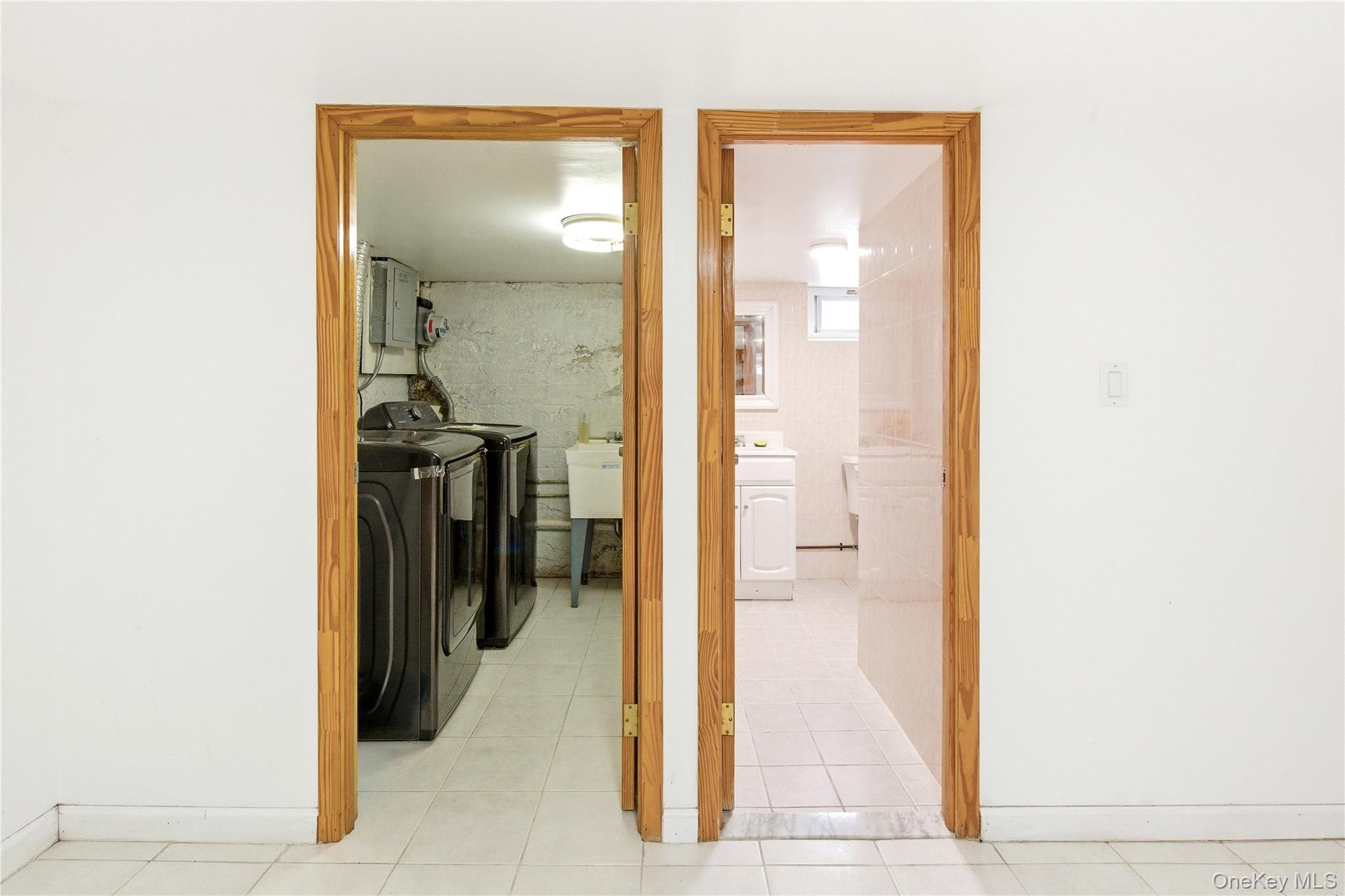 67-99 Exeter Street Queens, NY 11375 - Photo 21 of 28 a view of a bathroom from a hallway