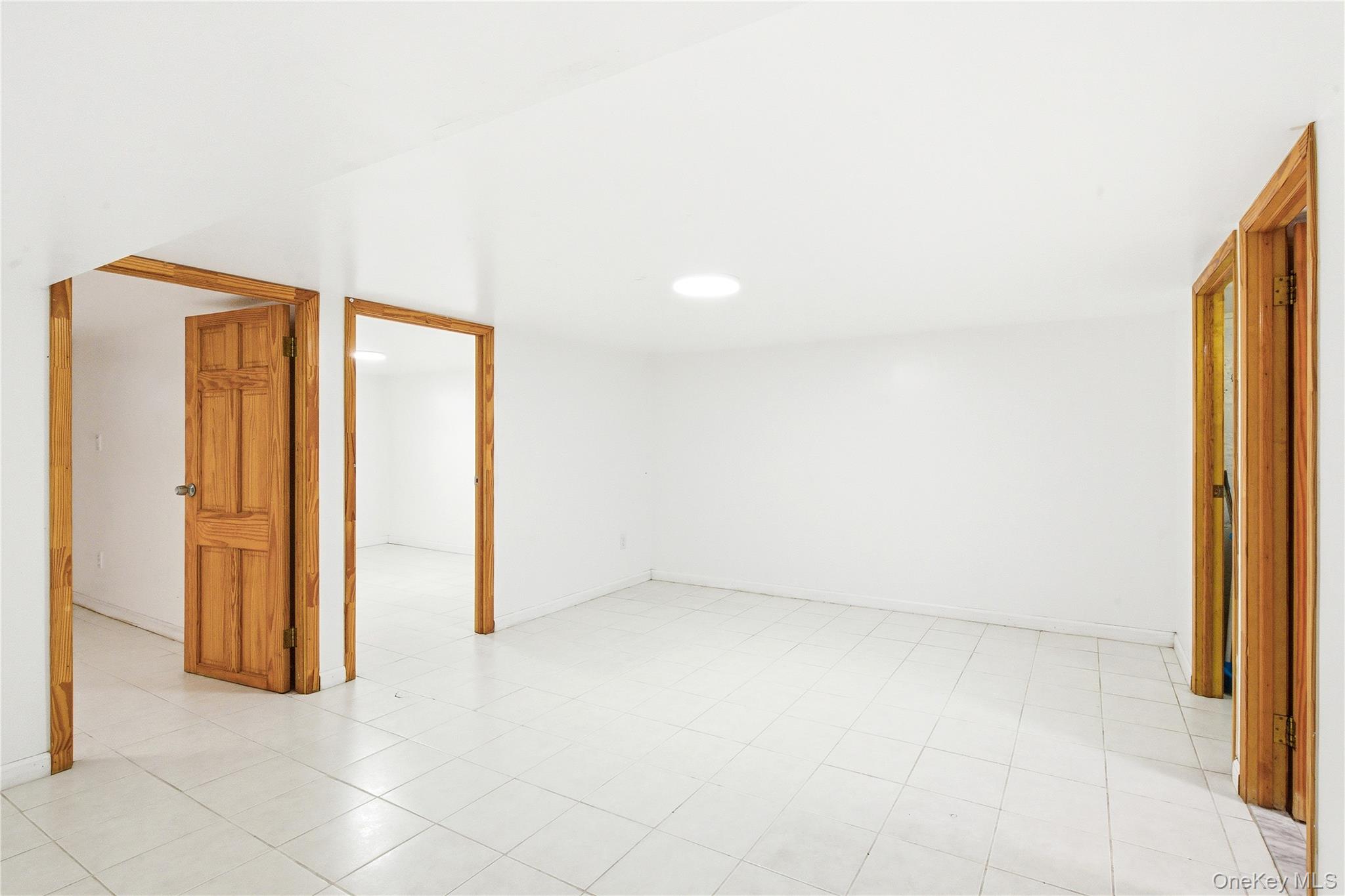 67-99 Exeter Street Queens, NY 11375 - Photo 24 of 28 an empty room with window