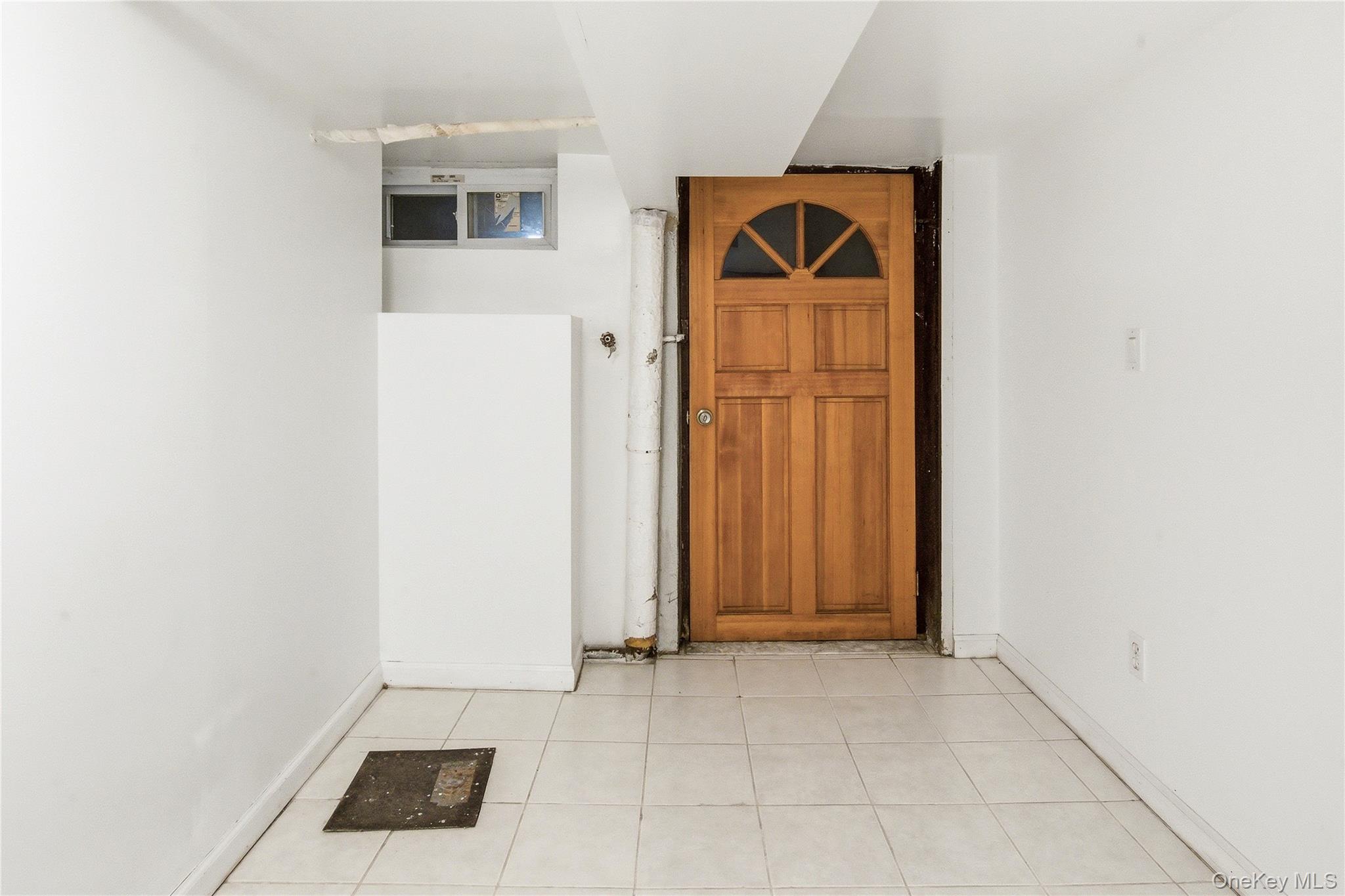 67-99 Exeter Street Queens, NY 11375 - Photo 25 of 28 a view of front door of house