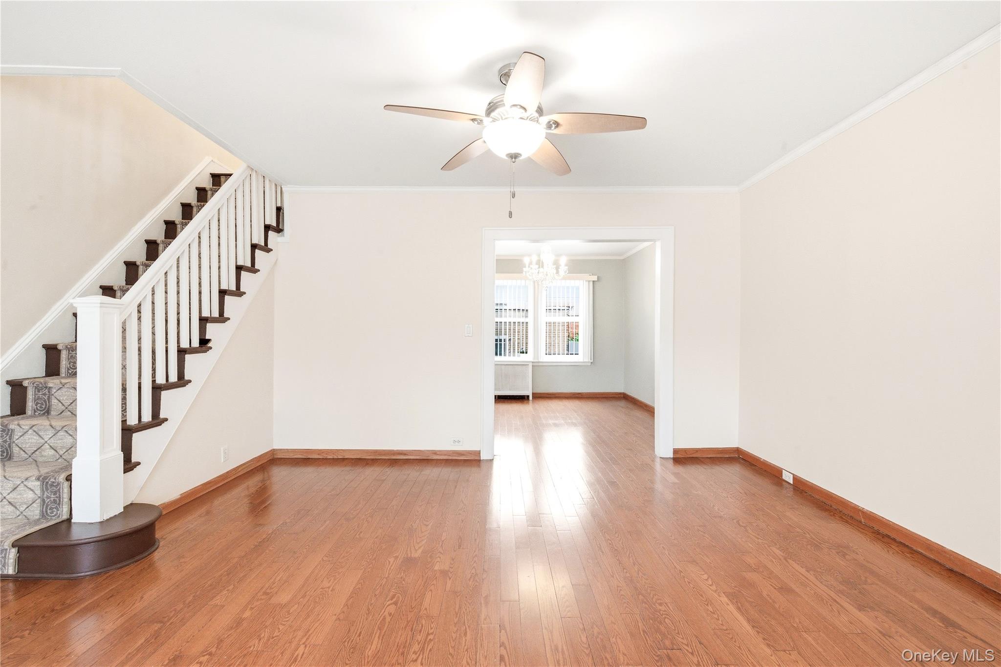 67-99 Exeter Street Queens, NY 11375 - Photo 6 of 28 a view of an entryway with wooden floor