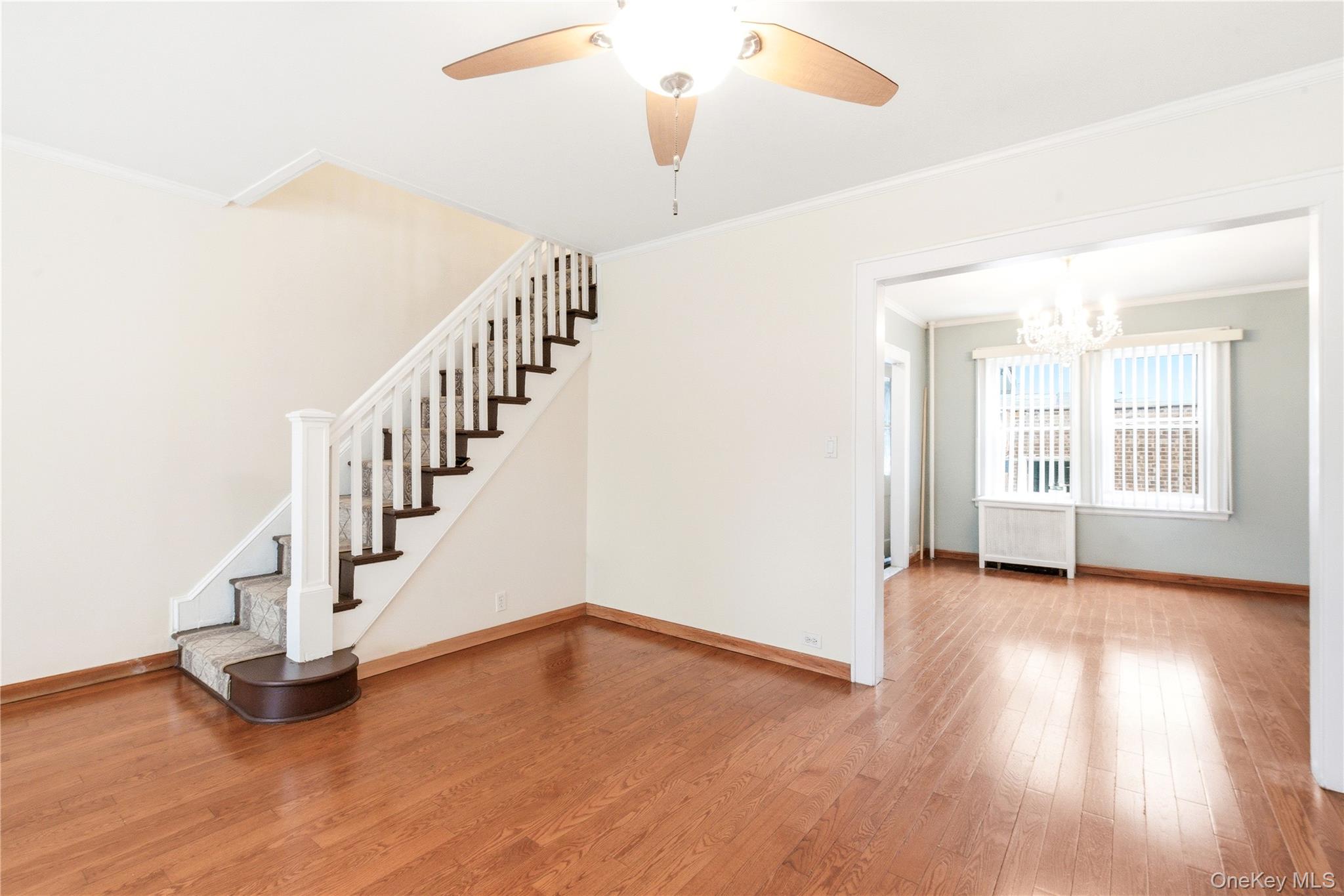 67-99 Exeter Street Queens, NY 11375 - Photo 8 of 28 a view of an entryway with wooden floor