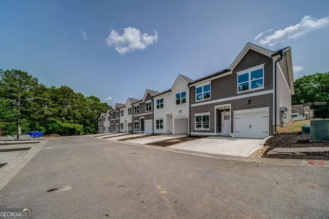 a bathroom with a bathtub and a toilet