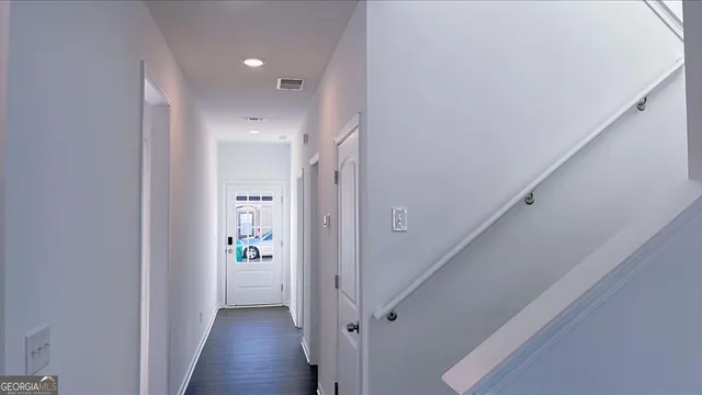 a view of wooden deck and a yard