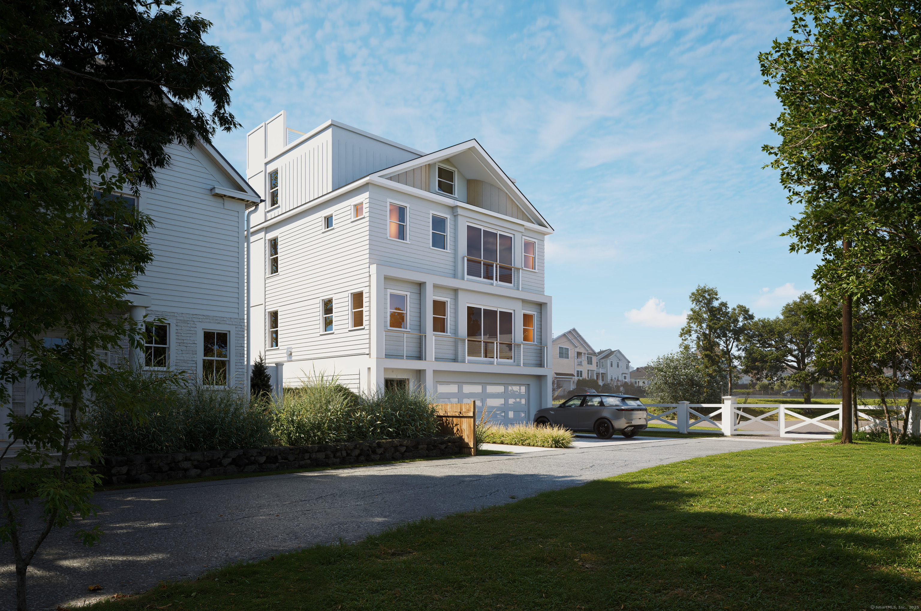 345 Old Dam Road Fairfield, CT 06824 - Photo 5 of 8 a front view of house with yard and green space