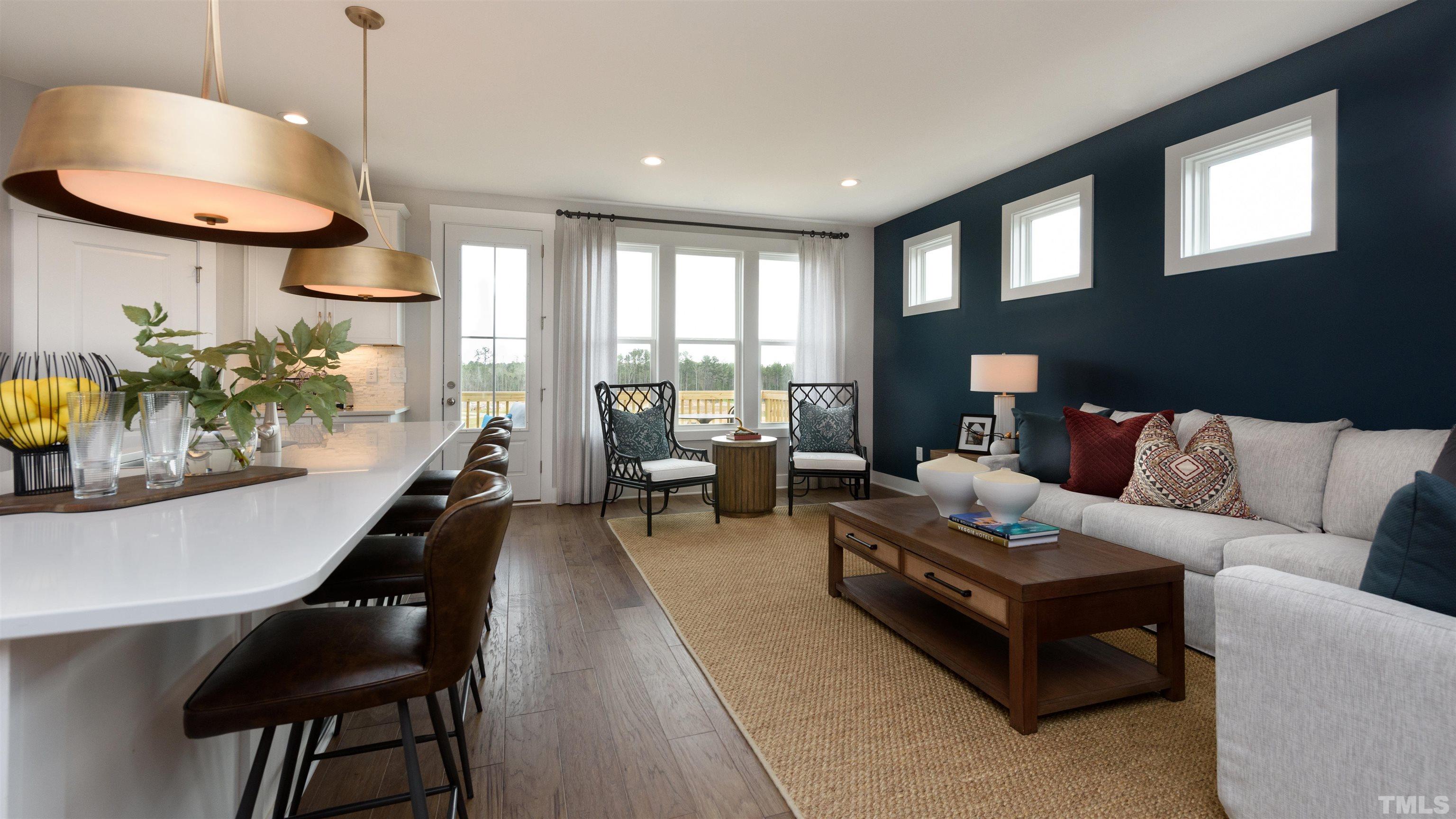 3255 Lynn Road, Unit 15 Raleigh, NC 27613 - Photo 20 of 21 a living room with furniture and a large window