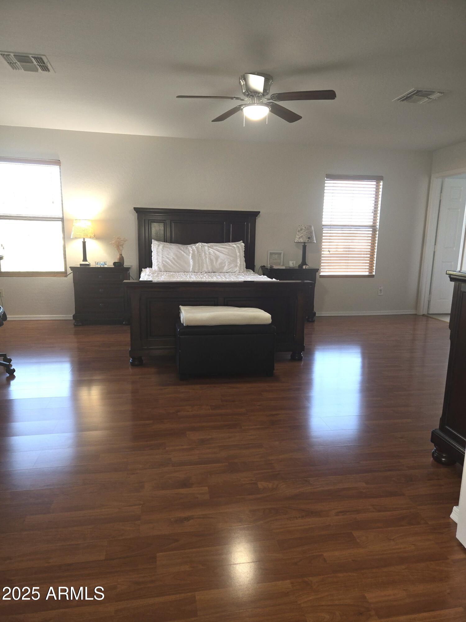 3283 South Conestoga Road Apache Junction, AZ 85119 - Photo 14 of 32 a bedroom with a bed and window